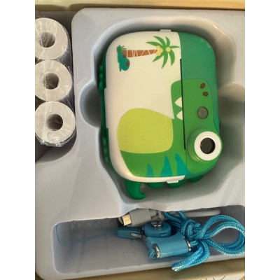 Detský fotoaparát s termotlačiarňou na okamžitú tlač, motív dinosaura, farba modrá.