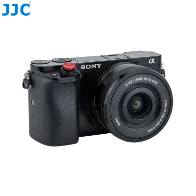 copy of JJC SRB-NSCBK   Nalepovací tlačítko na nešroubované spouště fotoaparátu, černé